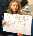 Greta Thunberg holding an paper stating "STAND WITH GAZA", to her right a grumpy looking kraken.